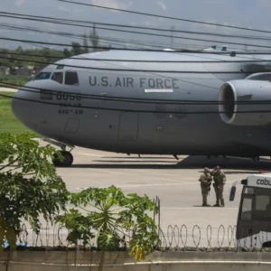 A U.S. military cargo plane arrived on Saturday at Toussaint Louverture International Airport in Port-au-Prince. An operations base for the international mission is being set up at the airport.Credit...Odelyn Joseph/Associated Press