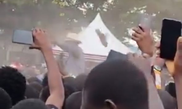 Moment an object that looks like a shoe flies past President Ruto while addressing the public in Migori.