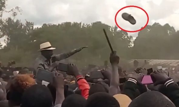 A shoe flying towards President William Ruto as he addresses a rally in Kuria West, Migori county on Sunday May 4, 2025.