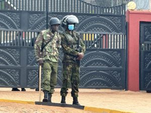 Armed police stay guard outside Natembeya’s home.