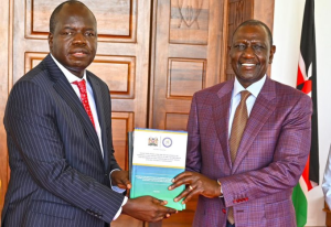 President William Ruto with IEBC selection panel Chair Nelson Makanda when he received the report on the recruitment of nominees to the Independent Electoral and Boundaries Commission (IEBC) on May 6, 2025.
