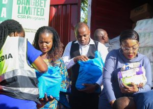 Rev. Mwikali graces an event sponsored by a gambling company.