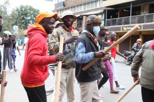Goons armed with rungus roaming Nairobi streets during clash with protesters.