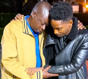 A screenshot showing Meshack Opiyo, the father of 31-year-old teacher Albert Ojwang being comforted by comedian Eric Omondi.
