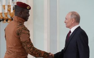 Russia's President Vladimir Putin shakes hands with Burkina Faso's interim President Ibrahim Traore at a past meeting [Courtesy/Reuters]