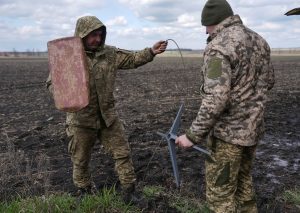 Starlink became a crucial communications tool for Ukraine after Russia launched its full-scale invasion in 2022. Here, Ukrainian soldiers earlier this year set up a Starlink terminal near front lines. REUTERS
