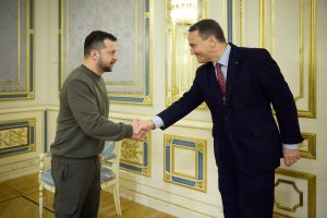 Poland, a major donor to Ukraine, has provided about half the Starlink terminals now being used in the country. President Volodymyr Zelenskiy, left, welcomed Polish Foreign Minister Radoslaw Sikorski to a 2023 meeting in Kyiv. Photo via Ukrainian Presidential Press Service