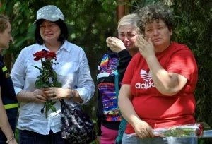 Residents mourned the 31 people killed in the attack on Kyiv, including five children (Sergei SUPINSKY)Sergei SUPINSKY/AFP/AFP