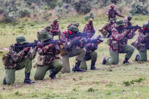 Kenyan police officers during an operation taking aim.