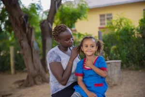 Generica Namoru pictured with her five-year old daughter Nicole. Namoru says she was in a consensual relationship with a UK soldier but he has abandoned her and their child since leaving Kenya. Festo Lang/CNN