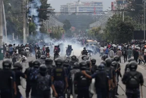Riot police personnel chase demonstrators during a protest against corruption and the government's decision to block several social media platforms, in Kathmandu, Nepal, on September 8, 2025. Navesh Chitrakar/Reuters