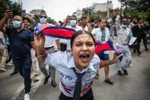 A demonstrator shouts slogans during a protest outside the Parliament in Kathmandu on September 8, 2025, condemning social media prohibitions and corruption by the government. Prabin Ranabhat/AFP/Getty Images