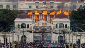 Fire and smoke rise from the Singha Durbar palace, which houses government and parliament buildings, as protesters stormed the premises in Kathmandu