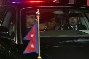 Nepal's new Prime Minister Sushila Karki (C) leaves the presidential palace after her swearing-in-ceremony in Kathmandu / AFP