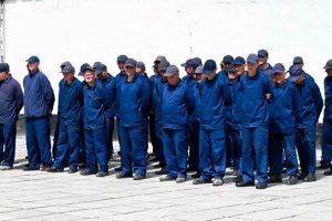 Prisoners of war stand in formation inside a Ukrainian detention facility where foreign fighters are held under strict supervision as part of wartime operations linked to the ongoing Russia-Ukraine conflict.