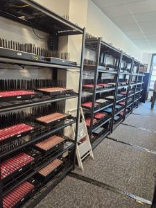 This photo provided by the U.S. Secret Service, in New York, Monday, Sept. 22, 2025, shows part of a wall of SIM boxes that were seized by the agency. (U.S. Secret Service via AP)