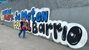 Graffiti in a pro-government neighbourhood reads: 'If you mess with Maduro, you mess with the neighbourhood"