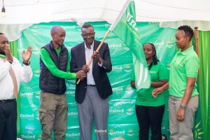 UGM co-founder and former Ndhiwa MP Neto Agostinho hands David Maraga the party’s flag.
