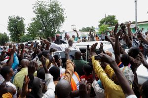 Presidential candidate Issa Tchiroma Bakary of the Cameroon National Salvation Front (FSNC) departs after casting his vote on the day of Cameroon’s presidential election at the polling station of Ecole Maternelle de Foulbere in Garoua, Cameroon