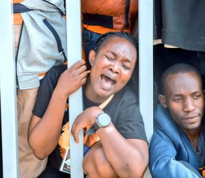 A mourner overwhelmed by grief at Mamboleo grounds where thousands da turned up for the public viewing of Raila’s body in Kisumu.