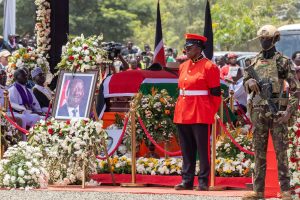Casket of late former PM Raila Odinga surrounded by security offficers during the funeral services at Jaramogi Oginga Odinga University of Science and Technology in Bondo.