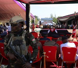 Casket of late former PM Raila Odinga surrounded by security offficers during the funeral services at Jaramogi Oginga Odinga University of Science and Technology in Bondo.