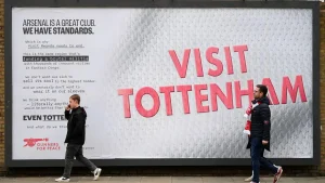 Campaigners put up a sign that read 'Visit Tottenham' outside the Emirates Stadium in April