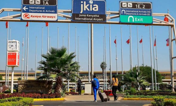 Travelers at Jomo Kenyatta International Airport in Nairobi.