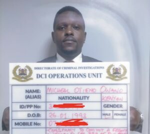 Police mugshot of Michael Otieno Owano