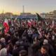 In Tehran's Enghlab square, thousands of mourners, dressed mostly in black, chanted 'death to America' while waving Iran's flag AFP