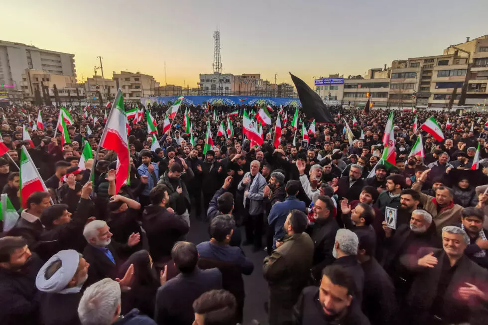 In Tehran's Enghlab square, thousands of mourners, dressed mostly in black, chanted 'death to America' while waving Iran's flag AFP