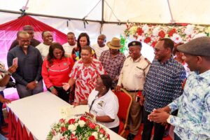 Eric Gumbo (extreme left) recently hosted government officials including Attorney General Dorcas Oduor, Treasury PS Chris Kiptoo, PS Ouma Oluga for a Huduma Mashinani event at Lwak Girls Secondary School in Rarieda.